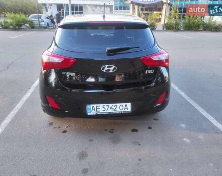 Чорний Хендай i30, об'ємом двигуна 1.6 л та пробігом 100 тис. км за 9900 $, фото 6 на Automoto.ua