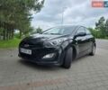 Черный Хендай i30, объемом двигателя 1.4 л и пробегом 305 тыс. км за 7050 $, фото 1 на Automoto.ua