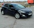 Черный Хендай i30, объемом двигателя 1.6 л и пробегом 105 тыс. км за 8999 $, фото 1 на Automoto.ua