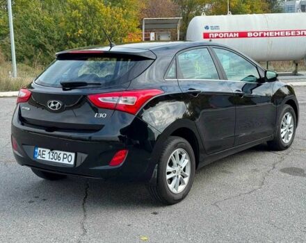 Черный Хендай i30, объемом двигателя 1.6 л и пробегом 105 тыс. км за 8999 $, фото 2 на Automoto.ua