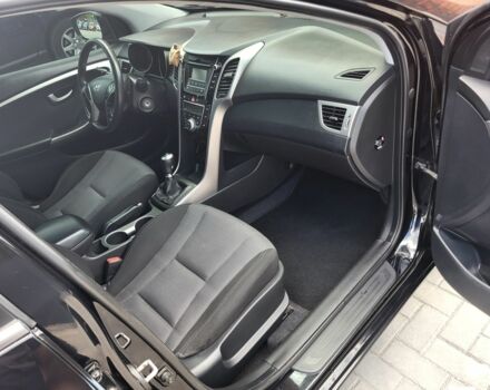 Чорний Хендай i30, об'ємом двигуна 1.6 л та пробігом 157 тис. км за 9500 $, фото 4 на Automoto.ua