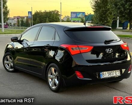 Чорний Хендай i30, об'ємом двигуна 1.6 л та пробігом 160 тис. км за 8699 $, фото 5 на Automoto.ua