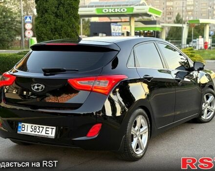 Чорний Хендай i30, об'ємом двигуна 1.6 л та пробігом 160 тис. км за 8699 $, фото 4 на Automoto.ua