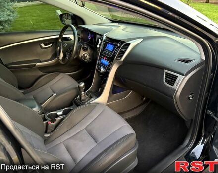 Чорний Хендай i30, об'ємом двигуна 1.6 л та пробігом 160 тис. км за 8699 $, фото 6 на Automoto.ua