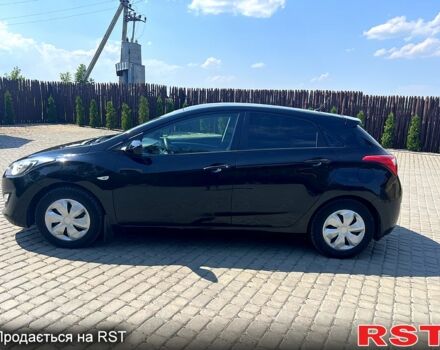 Черный Хендай i30, объемом двигателя 1.4 л и пробегом 164 тыс. км за 5999 $, фото 5 на Automoto.ua
