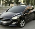 Чорний Хендай i30, об'ємом двигуна 1.6 л та пробігом 170 тис. км за 8555 $, фото 1 на Automoto.ua