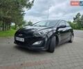Черный Хендай i30, объемом двигателя 1.4 л и пробегом 305 тыс. км за 7350 $, фото 1 на Automoto.ua