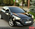 Чорний Хендай i30, об'ємом двигуна 1.6 л та пробігом 160 тис. км за 8699 $, фото 1 на Automoto.ua