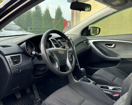 Черный Хендай i30, объемом двигателя 1.4 л и пробегом 259 тыс. км за 6600 $, фото 5 на Automoto.ua
