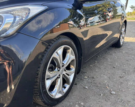 Чорний Хендай i30, об'ємом двигуна 1.58 л та пробігом 160 тис. км за 10900 $, фото 6 на Automoto.ua