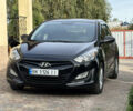 Черный Хендай i30, объемом двигателя 1.4 л и пробегом 259 тыс. км за 6600 $, фото 1 на Automoto.ua