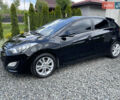 Черный Хендай i30, объемом двигателя 1.58 л и пробегом 220 тыс. км за 9000 $, фото 1 на Automoto.ua