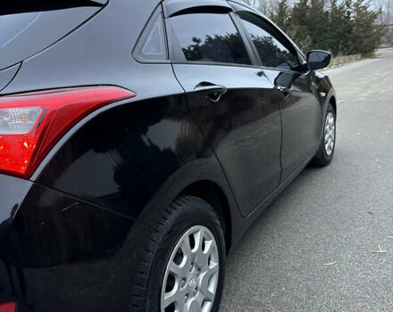 Черный Хендай i30, объемом двигателя 1.4 л и пробегом 200 тыс. км за 8500 $, фото 8 на Automoto.ua