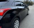 Черный Хендай i30, объемом двигателя 1.4 л и пробегом 200 тыс. км за 8500 $, фото 8 на Automoto.ua