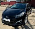 Чорний Хендай i30, об'ємом двигуна 1.4 л та пробігом 220 тис. км за 7300 $, фото 1 на Automoto.ua