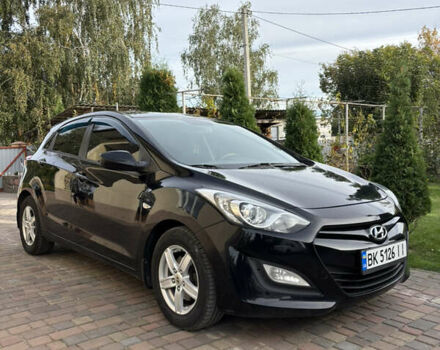 Черный Хендай i30, объемом двигателя 1.4 л и пробегом 259 тыс. км за 6600 $, фото 2 на Automoto.ua