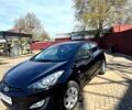 Черный Хендай i30, объемом двигателя 1.4 л и пробегом 220 тыс. км за 7500 $, фото 1 на Automoto.ua