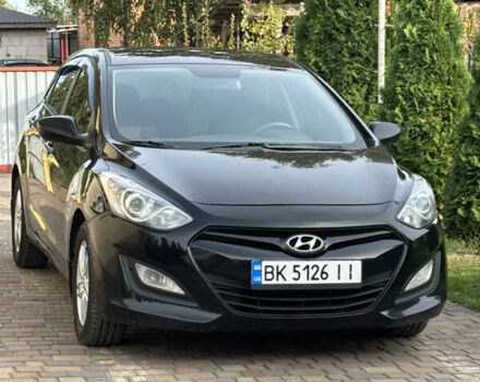 Черный Хендай i30, объемом двигателя 1.4 л и пробегом 259 тыс. км за 6600 $, фото 1 на Automoto.ua