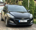 Черный Хендай i30, объемом двигателя 1.4 л и пробегом 259 тыс. км за 6600 $, фото 1 на Automoto.ua
