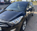 Чорний Хендай i30, об'ємом двигуна 1.58 л та пробігом 160 тис. км за 10900 $, фото 1 на Automoto.ua