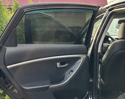 Черный Хендай i30, объемом двигателя 1.4 л и пробегом 259 тыс. км за 6600 $, фото 8 на Automoto.ua