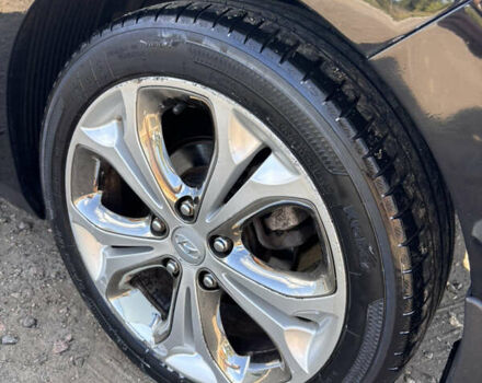 Чорний Хендай i30, об'ємом двигуна 1.58 л та пробігом 160 тис. км за 10900 $, фото 7 на Automoto.ua