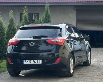 Черный Хендай i30, объемом двигателя 1.4 л и пробегом 259 тыс. км за 6600 $, фото 3 на Automoto.ua