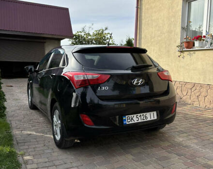 Черный Хендай i30, объемом двигателя 1.4 л и пробегом 259 тыс. км за 6600 $, фото 4 на Automoto.ua
