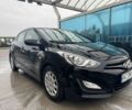 Черный Хендай i30, объемом двигателя 1.4 л и пробегом 160 тыс. км за 8600 $, фото 1 на Automoto.ua