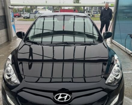 Черный Хендай i30, объемом двигателя 1.4 л и пробегом 160 тыс. км за 8600 $, фото 2 на Automoto.ua