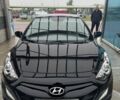 Черный Хендай i30, объемом двигателя 1.4 л и пробегом 160 тыс. км за 8600 $, фото 2 на Automoto.ua