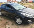 Черный Хендай i30, объемом двигателя 1.4 л и пробегом 155 тыс. км за 8200 $, фото 1 на Automoto.ua