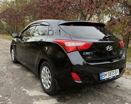 Черный Хендай i30, объемом двигателя 1.58 л и пробегом 110 тыс. км за 8500 $, фото 6 на Automoto.ua