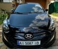 Черный Хендай i30, объемом двигателя 1.58 л и пробегом 118 тыс. км за 11200 $, фото 1 на Automoto.ua