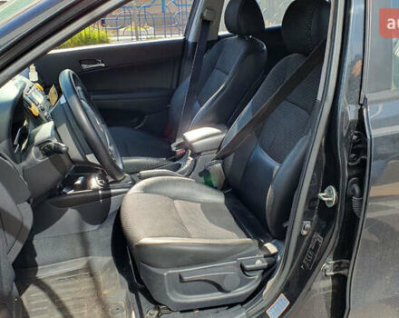 Черный Хендай i30, объемом двигателя 1.6 л и пробегом 228 тыс. км за 6200 $, фото 8 на Automoto.ua