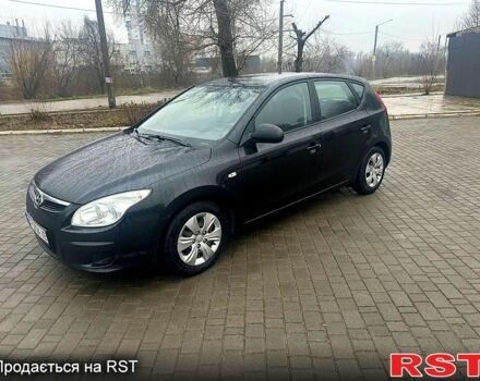 Черный Хендай i30, объемом двигателя 1.4 л и пробегом 210 тыс. км за 5200 $, фото 2 на Automoto.ua