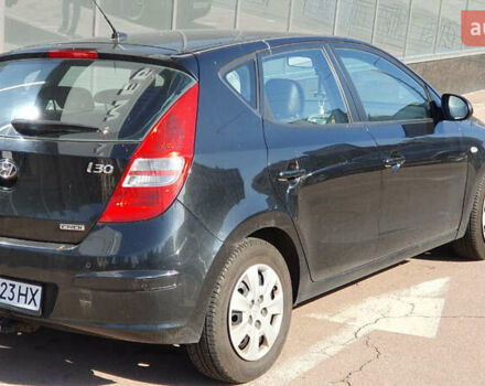 Черный Хендай i30, объемом двигателя 1.6 л и пробегом 228 тыс. км за 6200 $, фото 3 на Automoto.ua