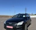 Черный Хендай i30, объемом двигателя 1.6 л и пробегом 220 тыс. км за 6500 $, фото 1 на Automoto.ua
