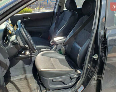 Черный Хендай i30, объемом двигателя 1.6 л и пробегом 228 тыс. км за 5200 $, фото 30 на Automoto.ua