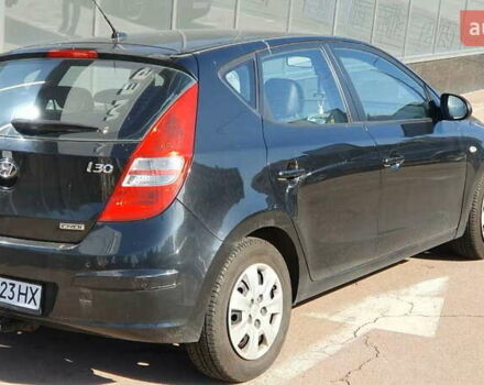 Черный Хендай i30, объемом двигателя 1.6 л и пробегом 228 тыс. км за 5200 $, фото 5 на Automoto.ua