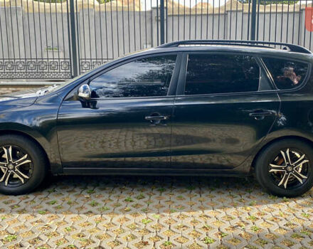 Чорний Хендай i30, об'ємом двигуна 1.6 л та пробігом 232 тис. км за 6200 $, фото 5 на Automoto.ua
