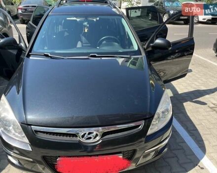Черный Хендай i30, объемом двигателя 1.58 л и пробегом 234 тыс. км за 5650 $, фото 4 на Automoto.ua