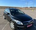 Чорний Хендай i30, об'ємом двигуна 1.6 л та пробігом 194 тис. км за 6750 $, фото 1 на Automoto.ua