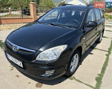 Черный Хендай i30, объемом двигателя 1.59 л и пробегом 226 тыс. км за 6500 $, фото 2 на Automoto.ua