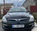 Черный Хендай i30, объемом двигателя 1.6 л и пробегом 324 тыс. км за 4900 $, фото 1 на Automoto.ua