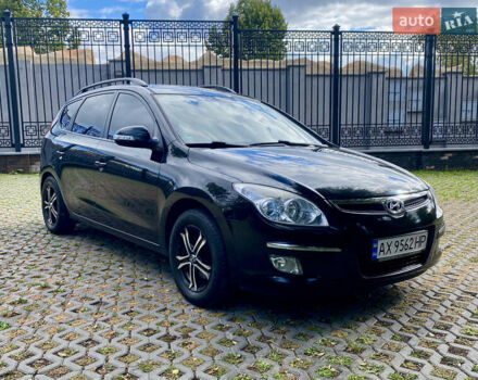 Чорний Хендай i30, об'ємом двигуна 1.6 л та пробігом 232 тис. км за 6200 $, фото 2 на Automoto.ua