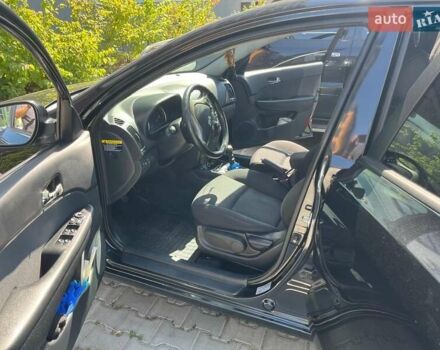 Черный Хендай i30, объемом двигателя 1.58 л и пробегом 234 тыс. км за 5650 $, фото 12 на Automoto.ua