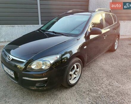 Черный Хендай i30, объемом двигателя 1.6 л и пробегом 200 тыс. км за 5500 $, фото 3 на Automoto.ua