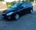 Черный Хендай i30, объемом двигателя 1.6 л и пробегом 230 тыс. км за 6600 $, фото 1 на Automoto.ua