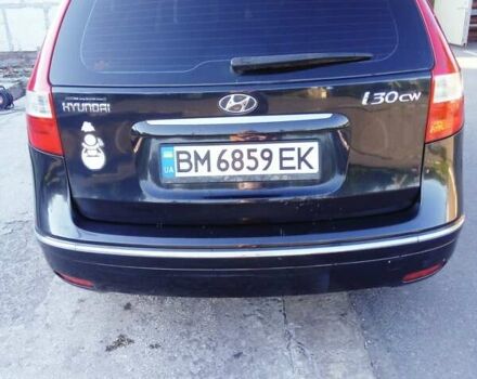Черный Хендай i30, объемом двигателя 1.6 л и пробегом 232 тыс. км за 6600 $, фото 1 на Automoto.ua